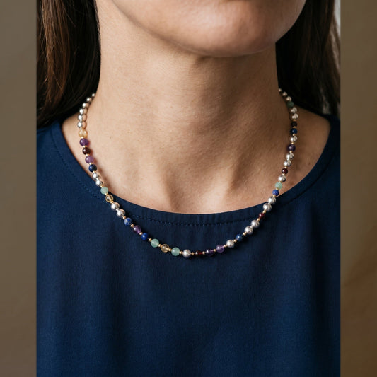 Silver Sphere Gold Accent DNA Profile Necklace, worn