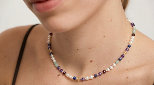 Pearl DNA Profile Necklace worn on the neck, close crop with no face shown
