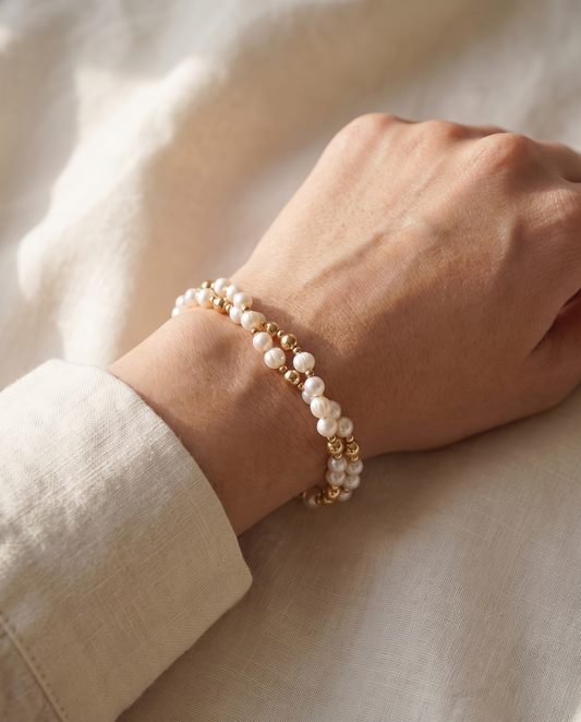 Twisted Pearl and Gold Bracelet worn on the wrist