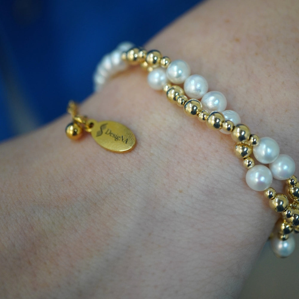 Twisted Pearl and Gold DNA Profile Bracelet worn on the wrist