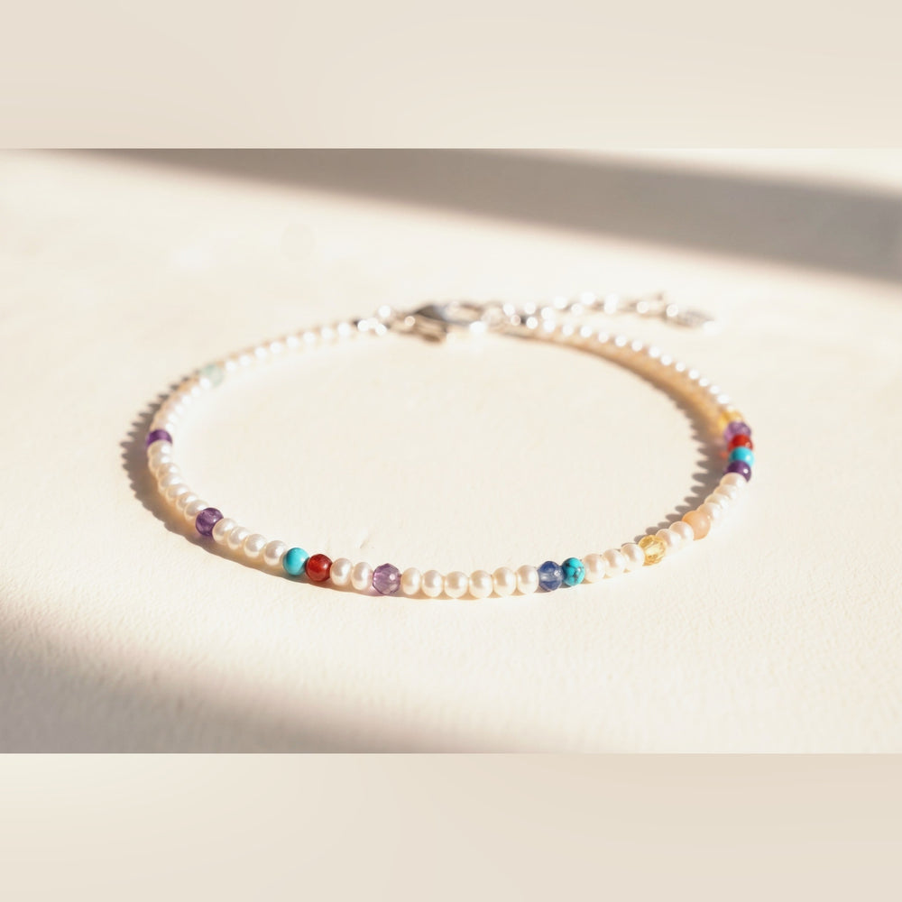 Pearl Clasp DNA Profile Bracelet, flat lay