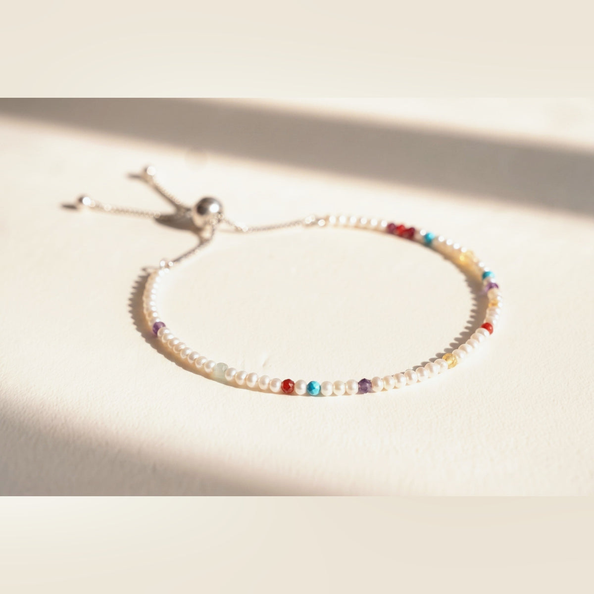 Spider Pearl Clasp DNA Profile Bracelet, flat lay