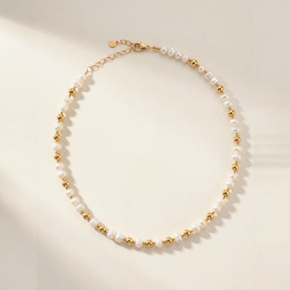 Pearl and Gold Pattern DNA Profile Necklace, flat lay