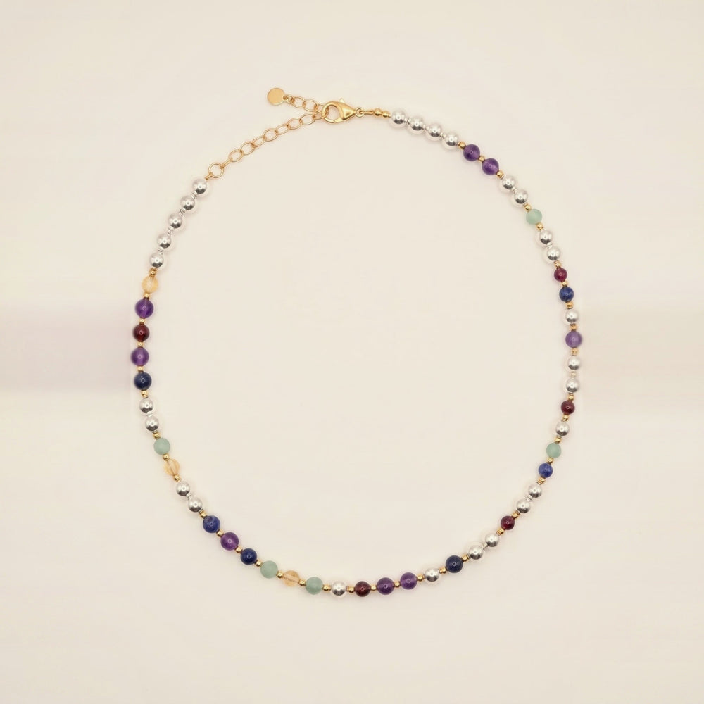 Silver Sphere Gold Accent DNA Profile Necklace, flat lay