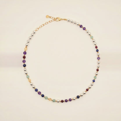 Silver Sphere Gold Accent DNA Profile Necklace, flat lay