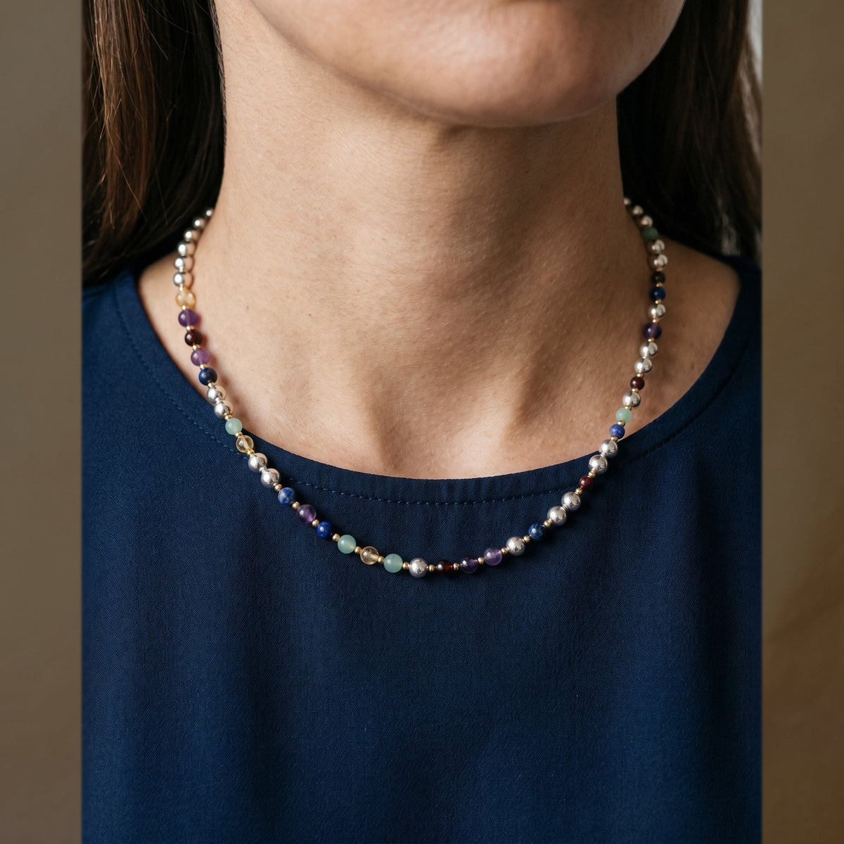 Silver Sphere Gold Accent DNA Profile Necklace, worn
