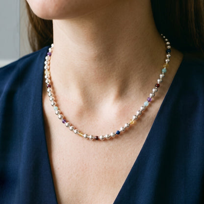 Silver Sphere DNA Profile Necklace, worn
