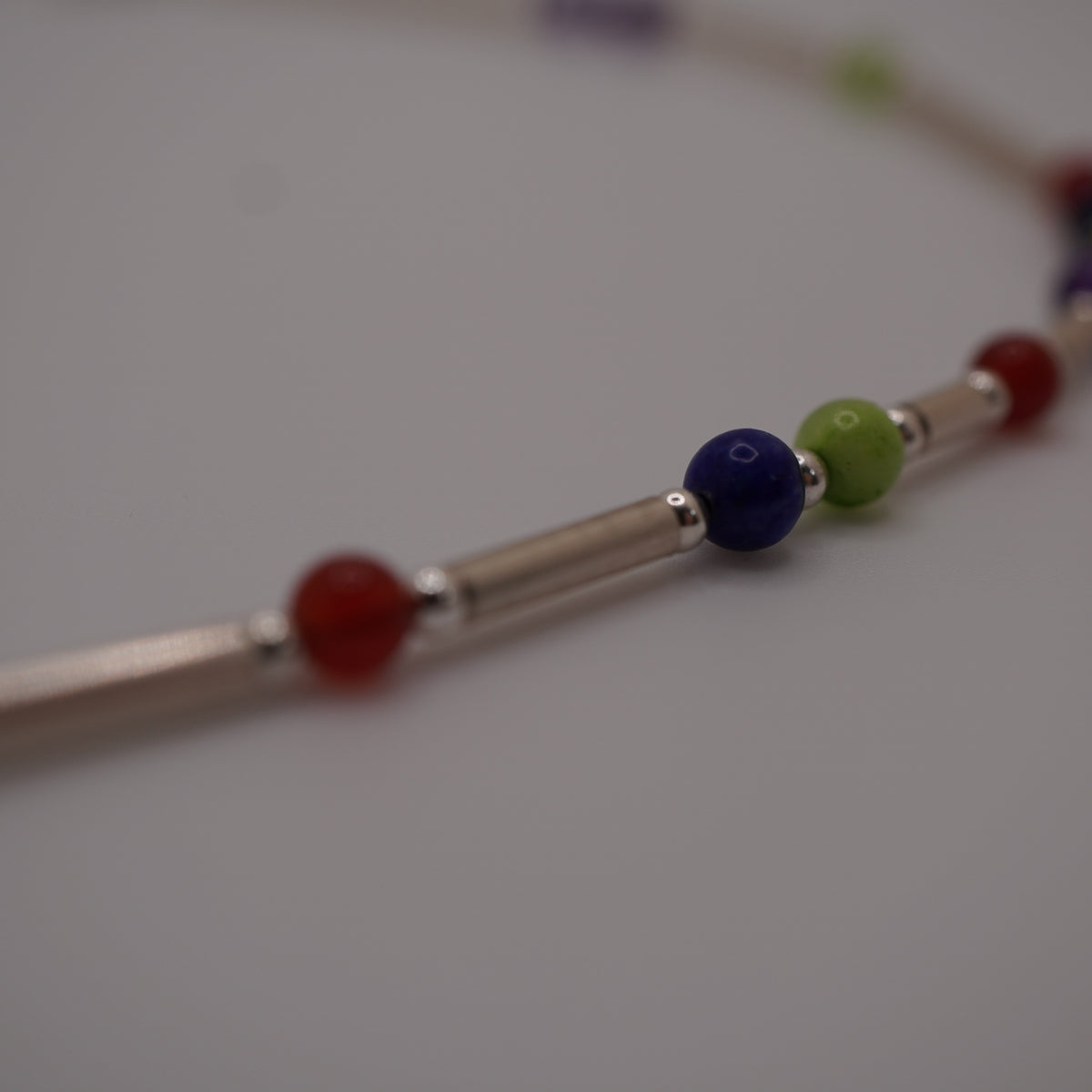 Silver DNA Profile Necklace, close up of the strand