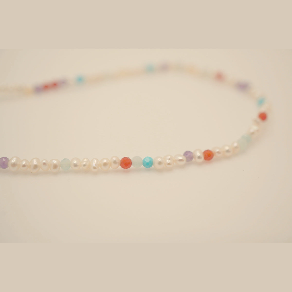 Pearl Clasp DNA Profile Bracelet, close up of the strand