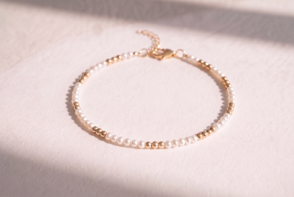 Pearl and Gold Clasp DNA Profile Bracelet, freshwater pearls with gold spheres marking the DNA positions, gold lobster clasp and extension chain