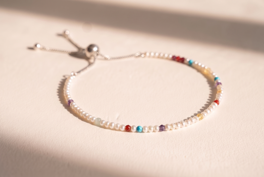 Spider Pearl DNA Profile Bracelet, fine freshwater pearls with gemstone markers on an adjustable slider