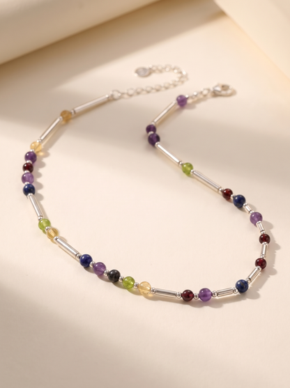 Silver DNA Profile Necklace, gemstone markers set between polished sterling silver batons in the order the DNA places them