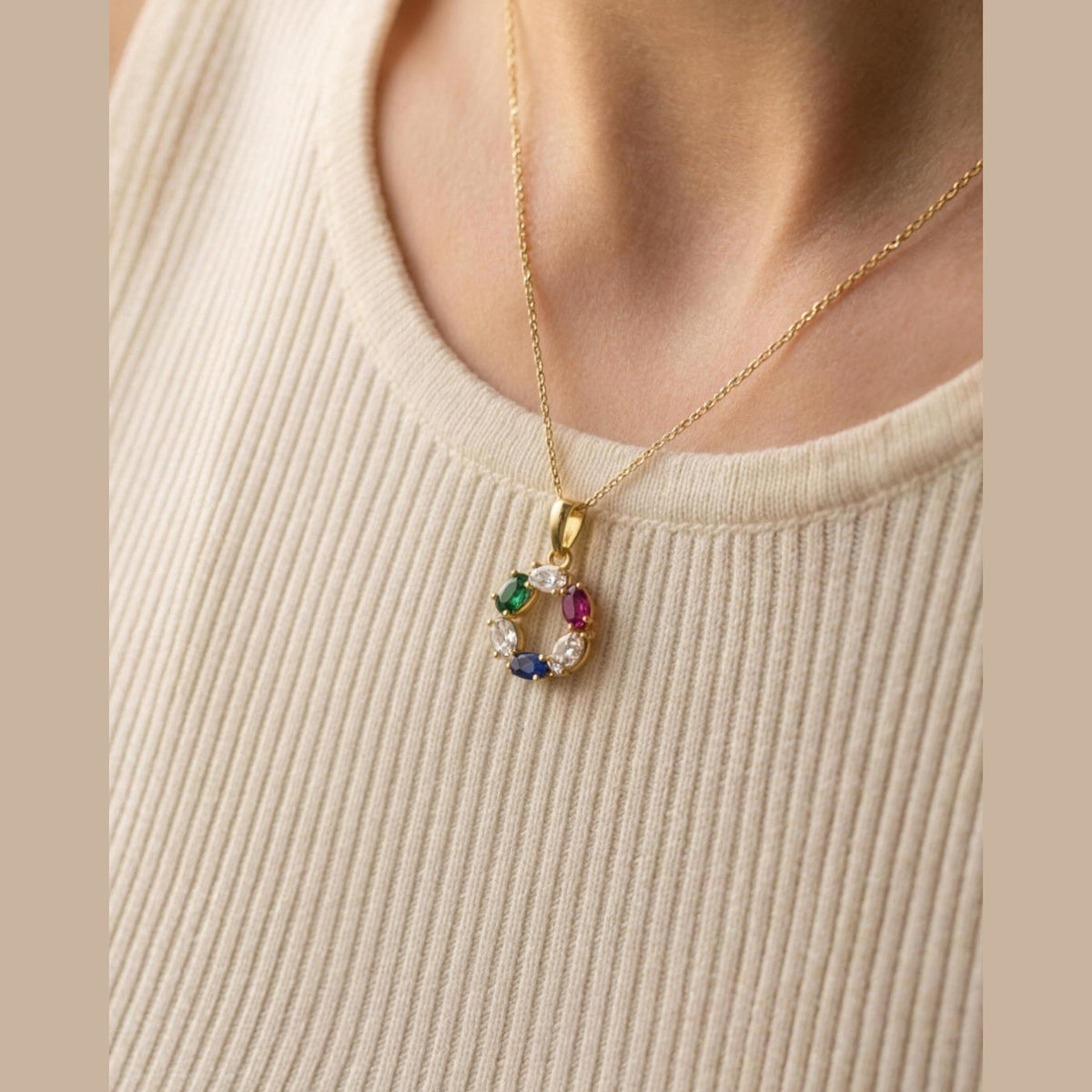 The DNA Representation Pendant worn, seen from a three quarter angle