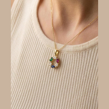 The DNA Representation Pendant worn, seen from a three quarter angle