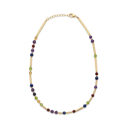 Gold DNA Profile Necklace laid flat in an oval loop on a white background