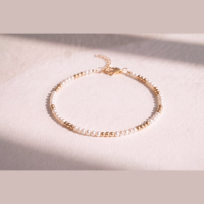 Pearl and Gold Clasp DNA Profile Bracelet, freshwater pearls with gold spheres marking the DNA positions, gold lobster clasp and extension chain