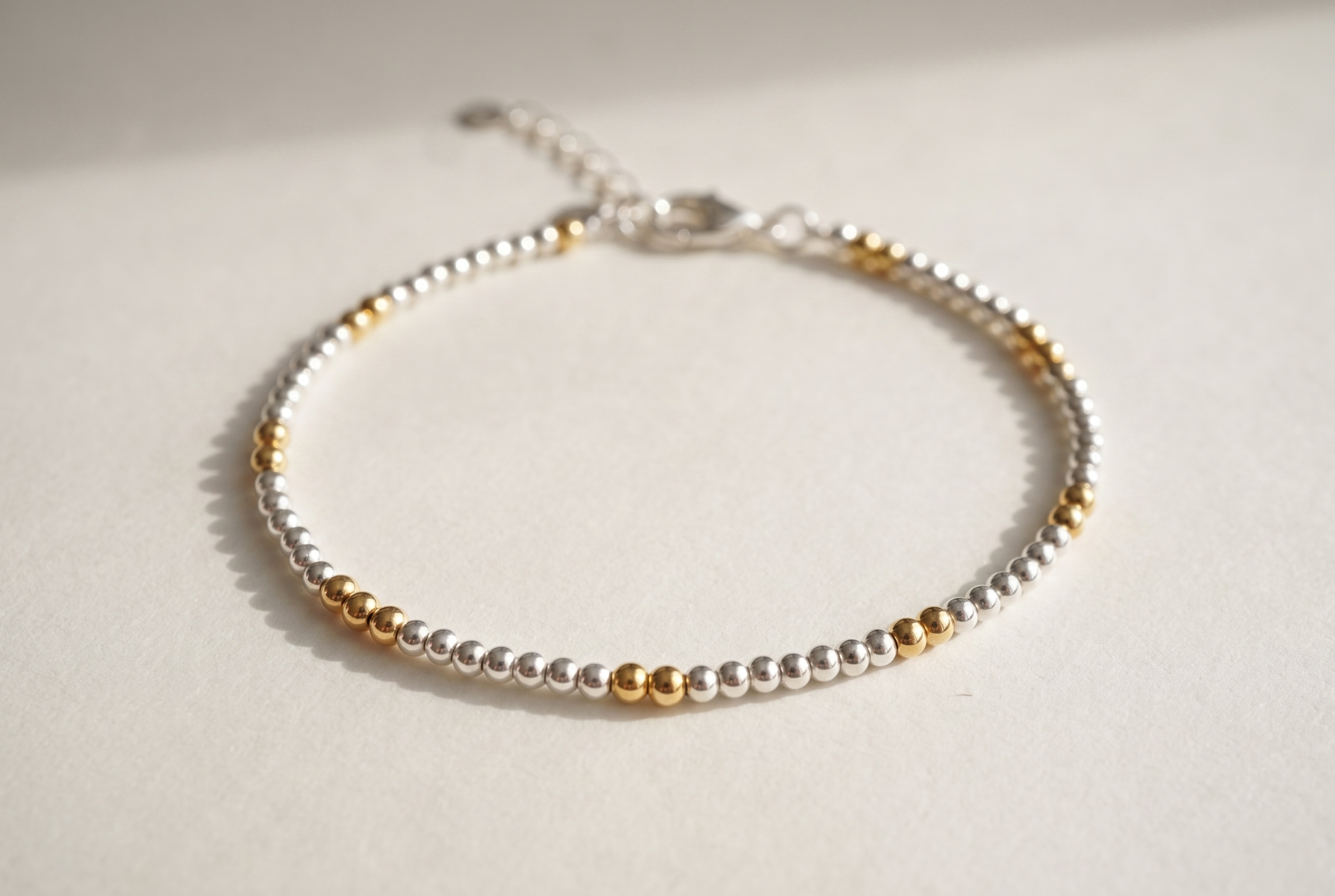 Silver and Gold Clasp Bracelet with silver beads and gold marker beads
