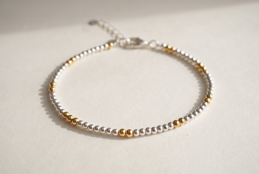 Silver and Gold Clasp Bracelet with silver beads and gold marker beads
