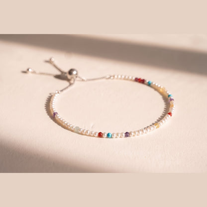 Spider Pearl DNA Profile Bracelet, fine freshwater pearls with gemstone markers on an adjustable slider