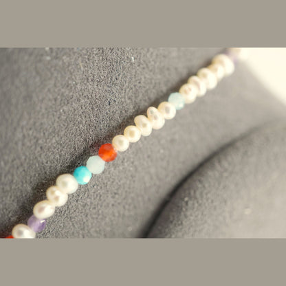 Close up of the Spider Pearl Clasp DNA Profile Bracelet pearls and stones