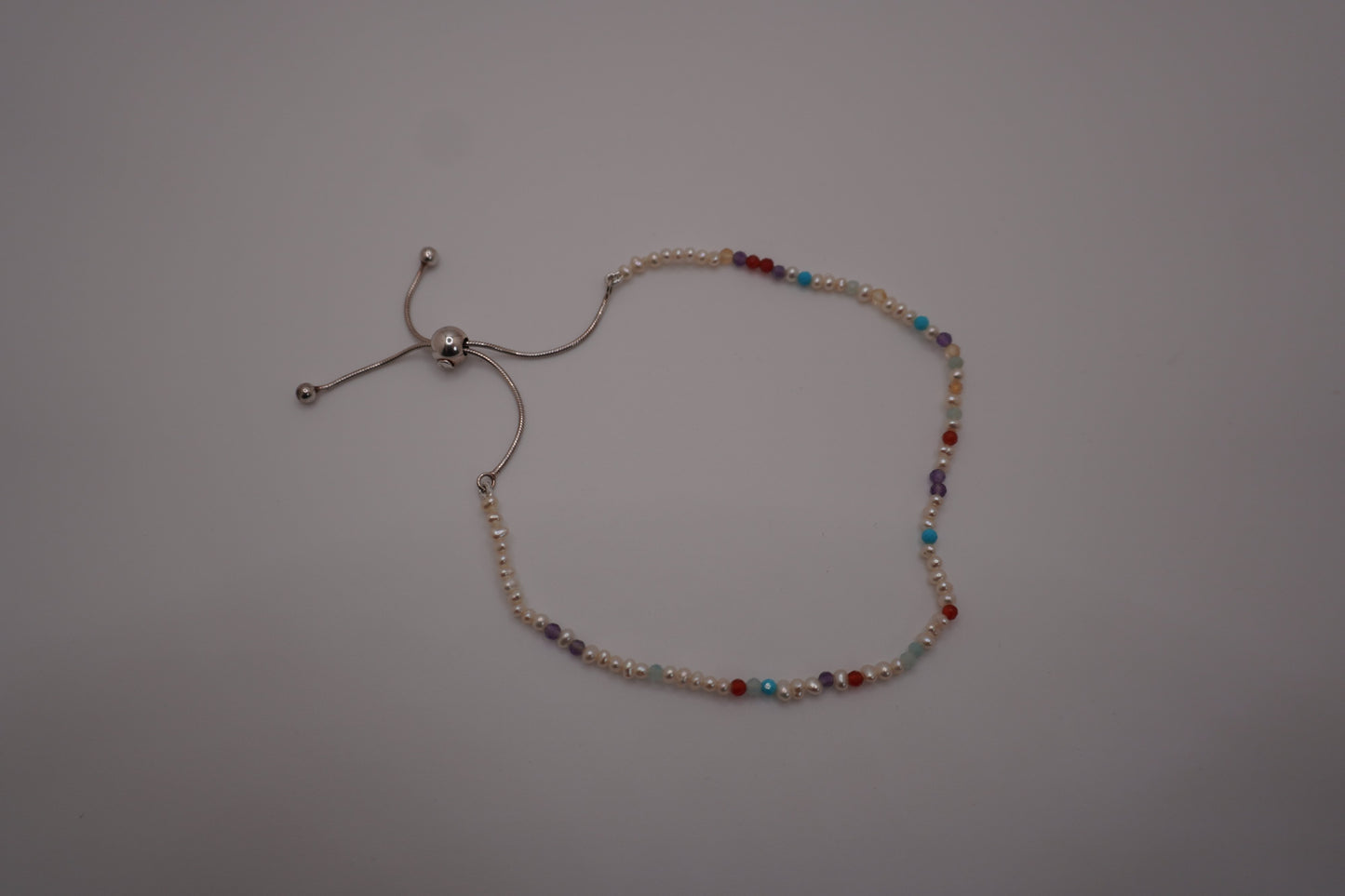 Spider Pearl Clasp Bracelet with freshwater pearls and gemstone markers, adjustable slider clasp