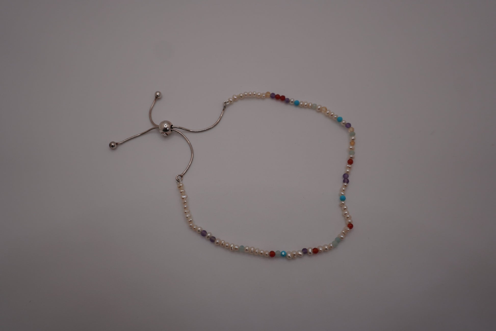 Spider Pearl Clasp Bracelet with freshwater pearls and gemstone markers, adjustable slider clasp