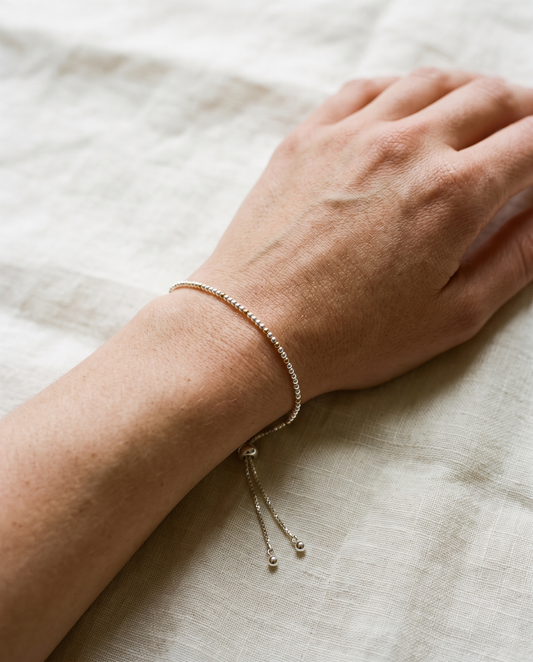 Spider Silver and Gold Bracelet worn on the wrist