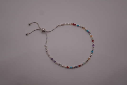 Spider Silver Clasp Bracelet with polished silver beads and gemstone markers, adjustable slider clasp