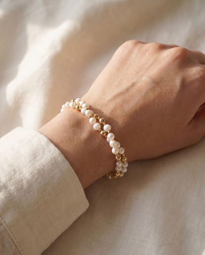 Twisted Pearl and Gold Bracelet worn on the wrist