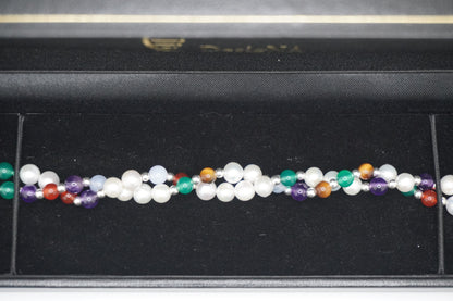 Close up of the Twisted Pearl Bracelet in the DesigNA box