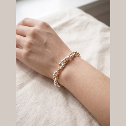 Twisted Silver and Gold DNA Profile Bracelet worn on the wrist
