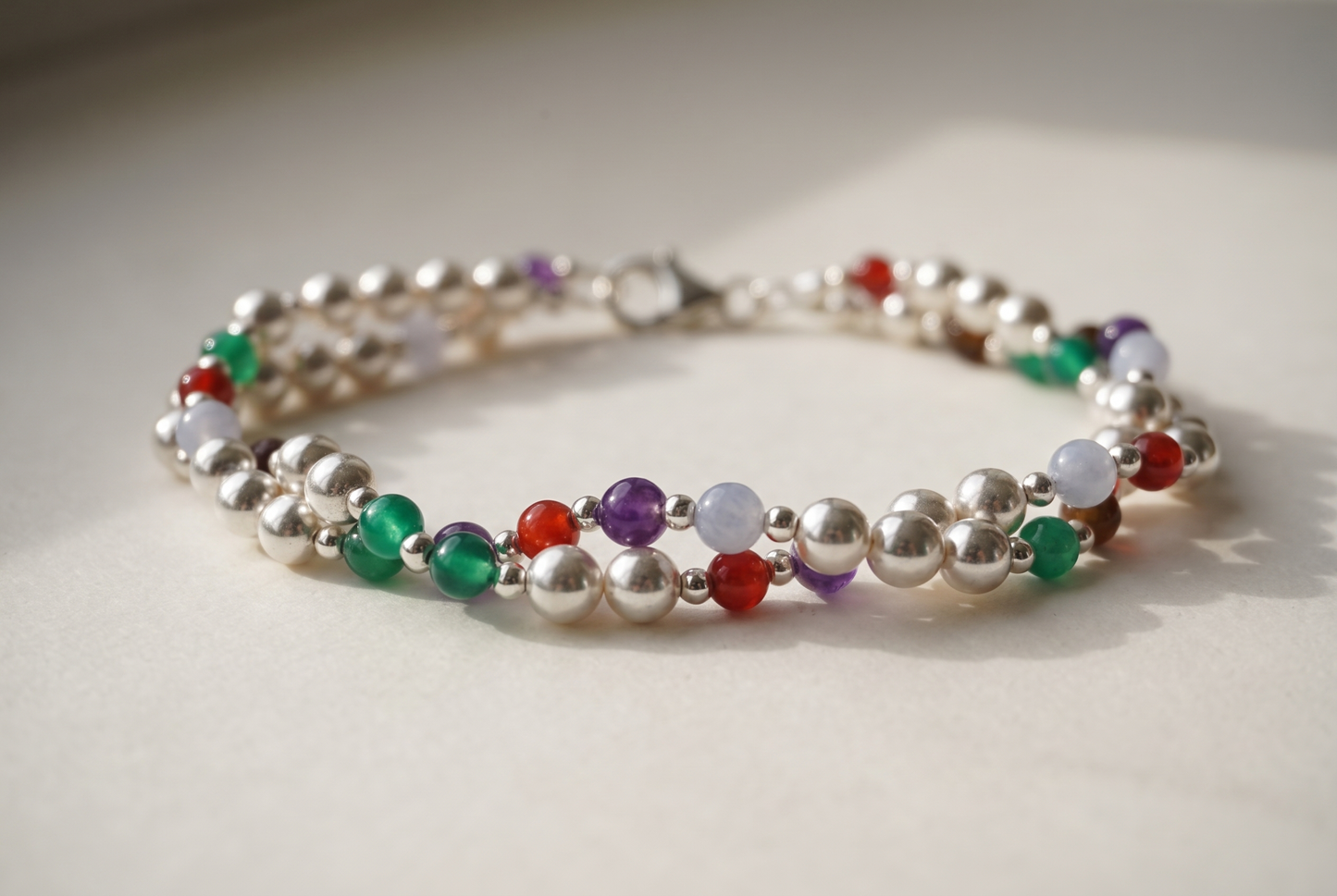 Twisted Silver Bracelet, two strands of silver beads and gemstone markers wound into a rope