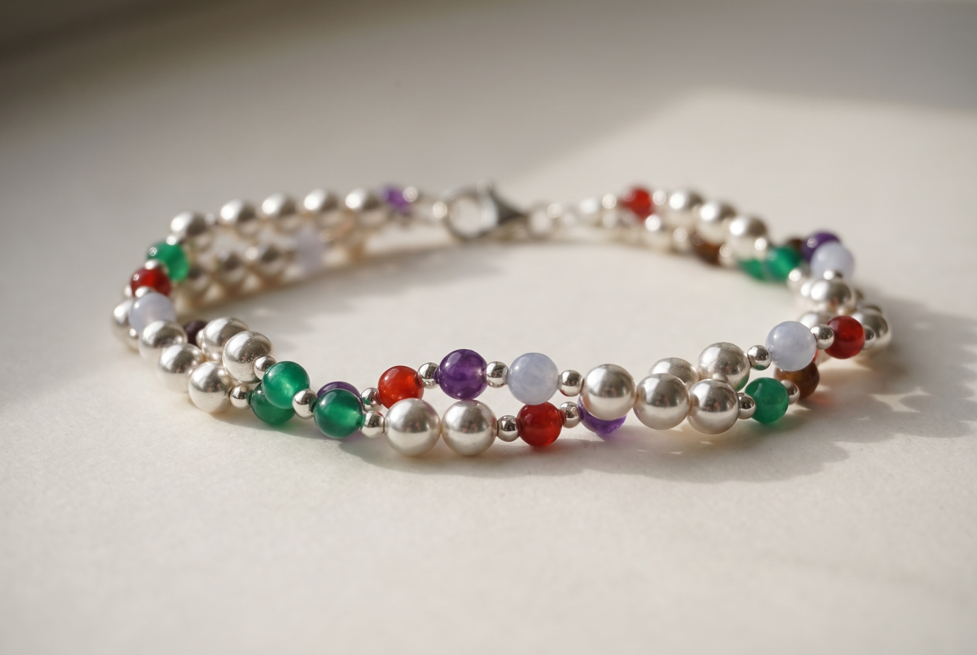 Twisted Silver Bracelet, two strands of silver beads and gemstone markers wound into a rope