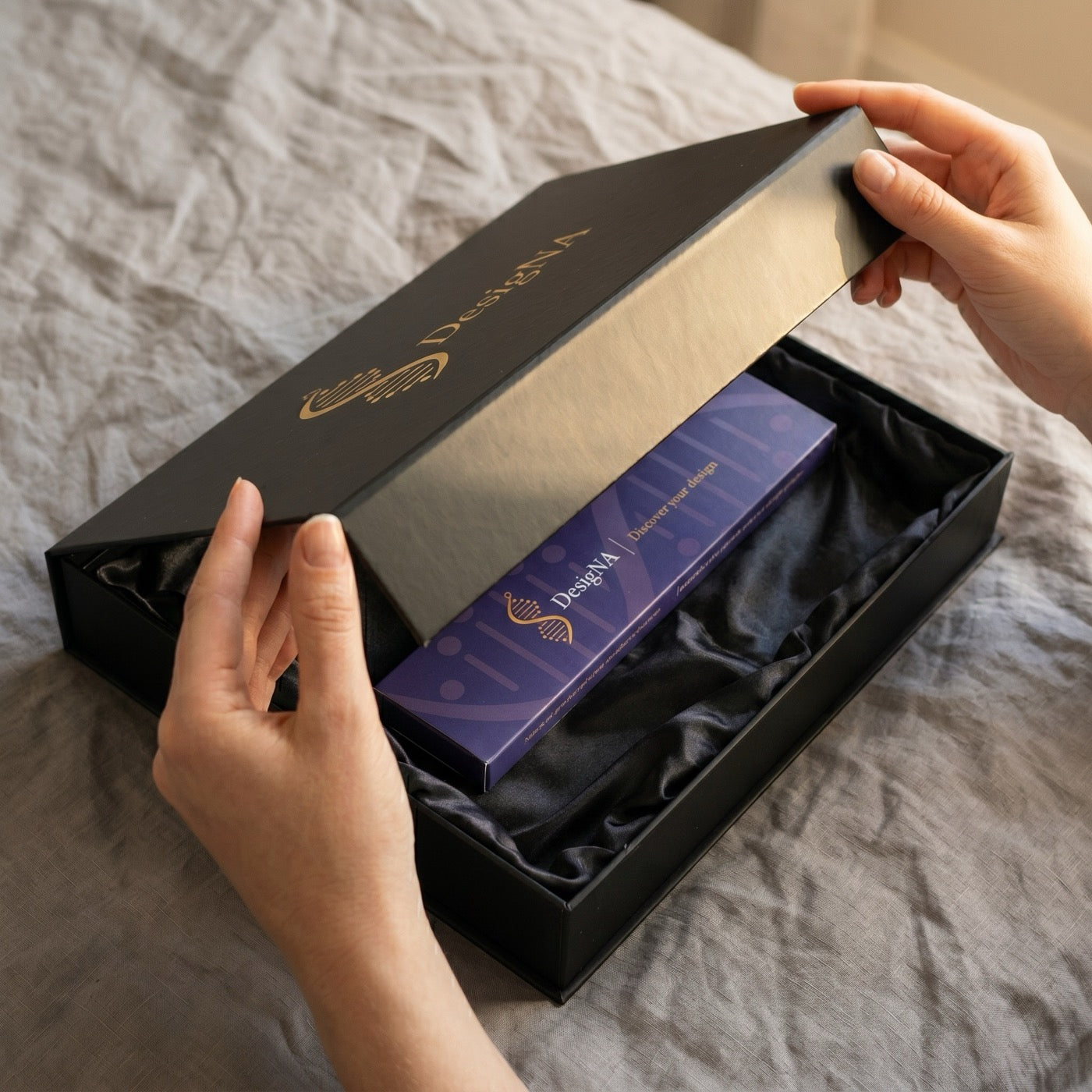 Navy DesigNA sleeve revealed inside the outer box