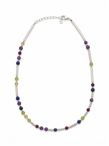 DNA necklace care guide showing silver, gold and pearl DesigNA necklaces laid out for cleaning